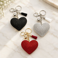 Lot de 3 bijoux de sac cœur à strass : noir, argenté et rouge